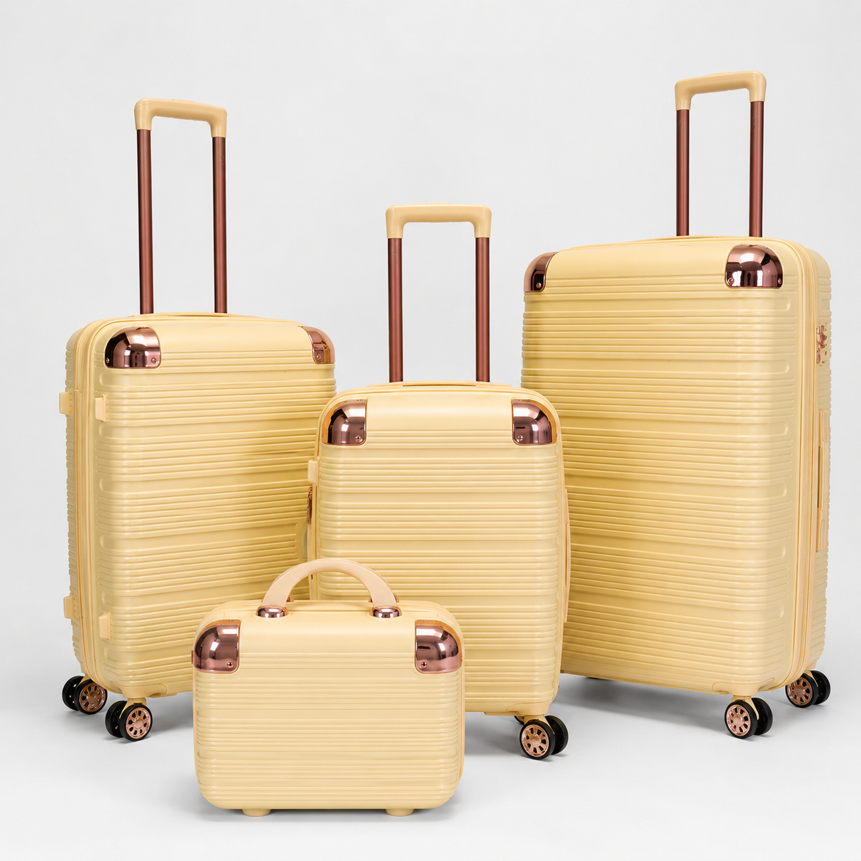 Voyalune cream and rose gold four-piece hardside spinner luggage set with vanity case