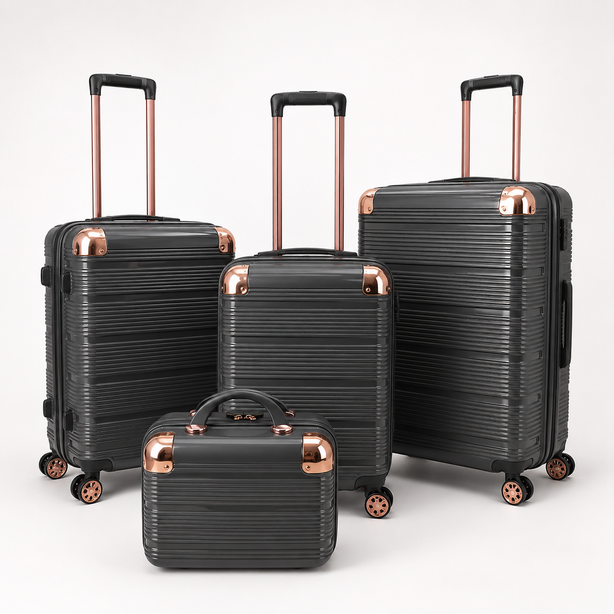 Voyalune dark grey and rose gold four-piece hardside spinner luggage set with vanity case