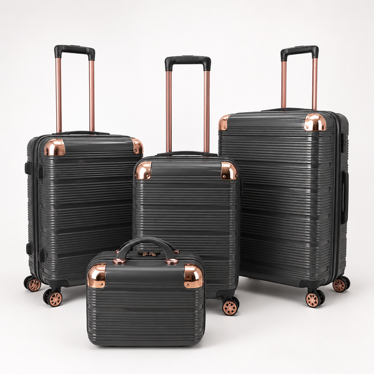 Voyalune dark grey and rose gold four-piece hardside spinner luggage set with vanity case