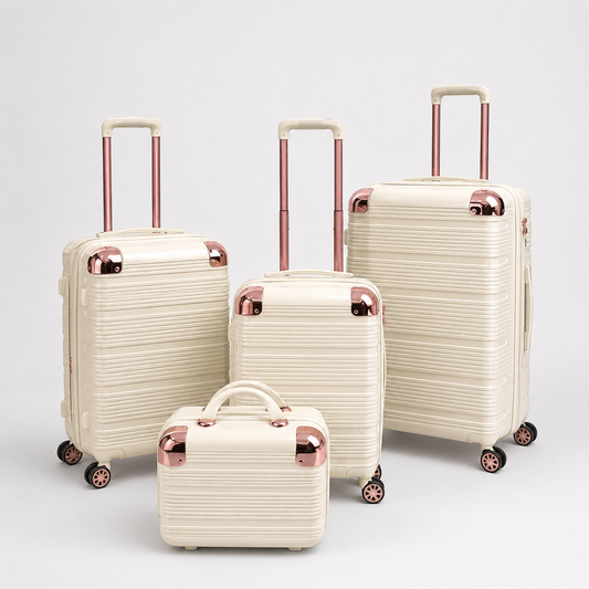 Voyalune ivory and rose gold four-piece hardside spinner luggage set with vanity case