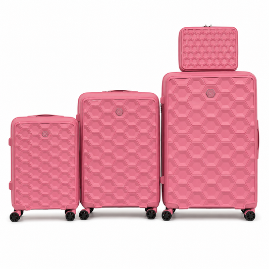 Terra Hex pink four-piece hardside luggage set with vanity case